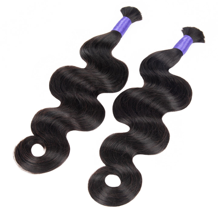 Two body wave braiding human hair bundles angled towards the top right